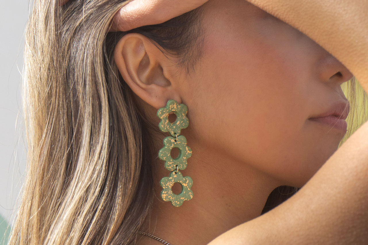 Floral accessories on woman's ear